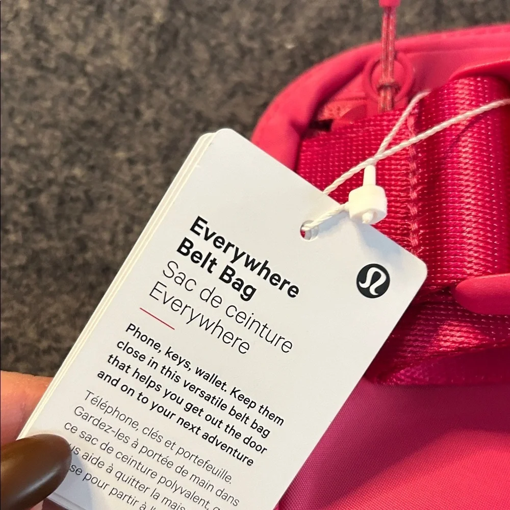 Lululemon Athletica NWT Bright Pink Cosmetic Bag SILVER hardware.